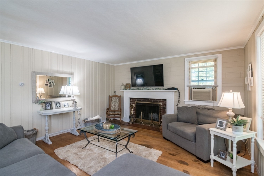 20 Dunton Street Montague, MA 01376 - Photo 18 of 36 a living room with furniture and a fireplace