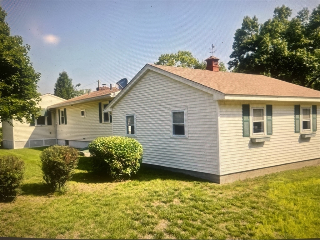 20 Dunton Street Montague, MA 01376 - Photo 32 of 36 a view of a white house with a yard