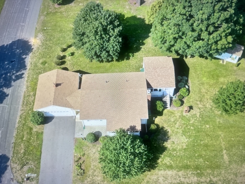 20 Dunton Street Montague, MA 01376 - Photo 6 of 36 an aerial view of a house with outdoor space and trees all around