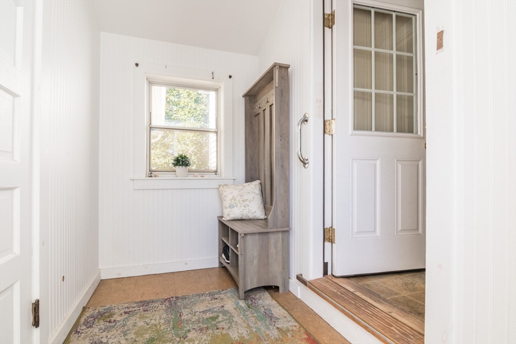 20 Dunton Street Montague, MA 01376 - Photo 7 of 36 a view of an empty room with wooden floor and a window