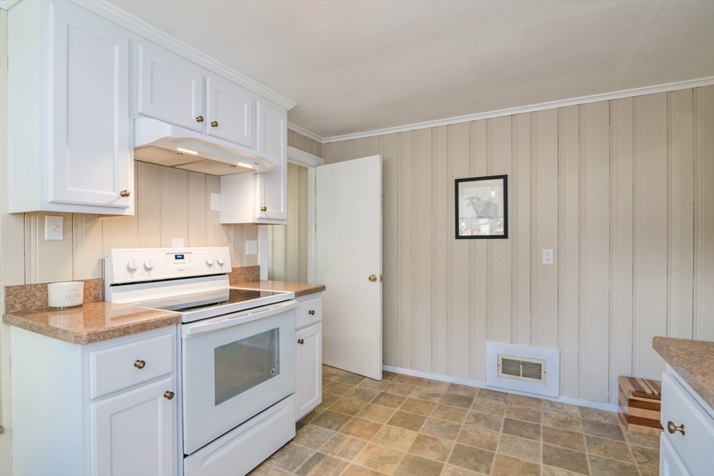 20 Dunton Street Montague, MA 01376 - Photo 10 of 36 a kitchen with cabinets and appliances