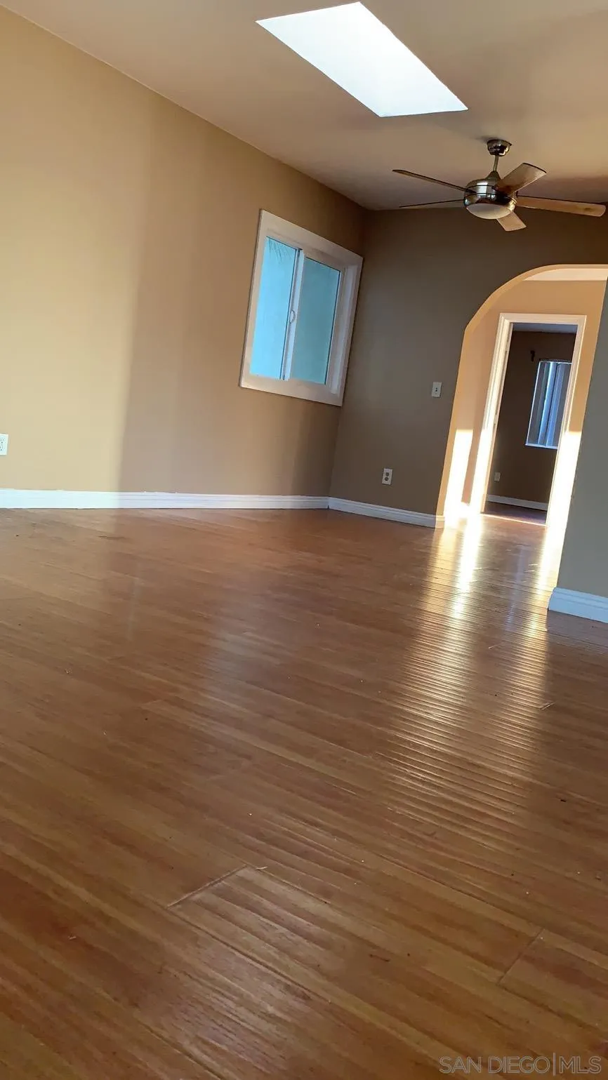 13605 Acton Avenue Poway, CA 92064 - Photo 13 of 18 a view of a room with wooden floor