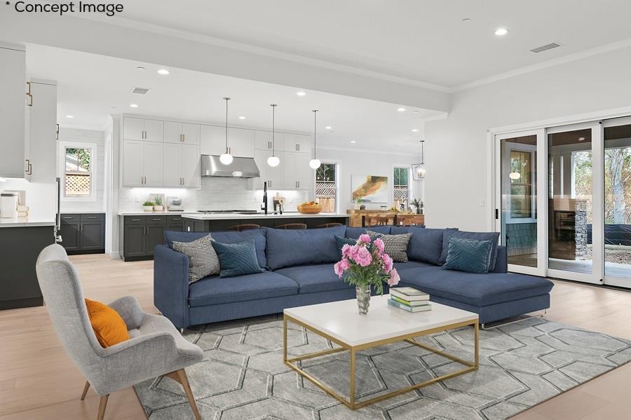 10567 John Way Cupertino, CA 95014 - Photo 3 of 11 a living room with furniture kitchen and a table