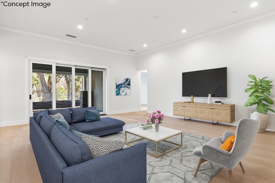 10567 John Way Cupertino, CA 95014 - Photo 6 of 11 a living room with furniture and a flat screen tv