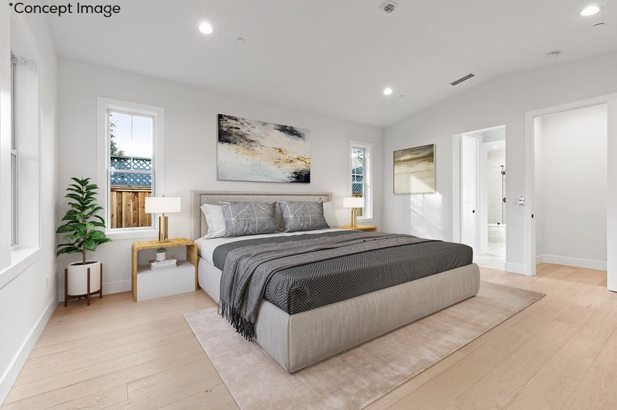 10567 John Way Cupertino, CA 95014 - Photo 7 of 11 a bedroom with a large bed and potted plant