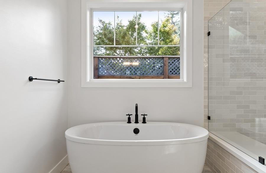 10567 John Way Cupertino, CA 95014 - Photo 9 of 11 a white bath tub sitting next to a window