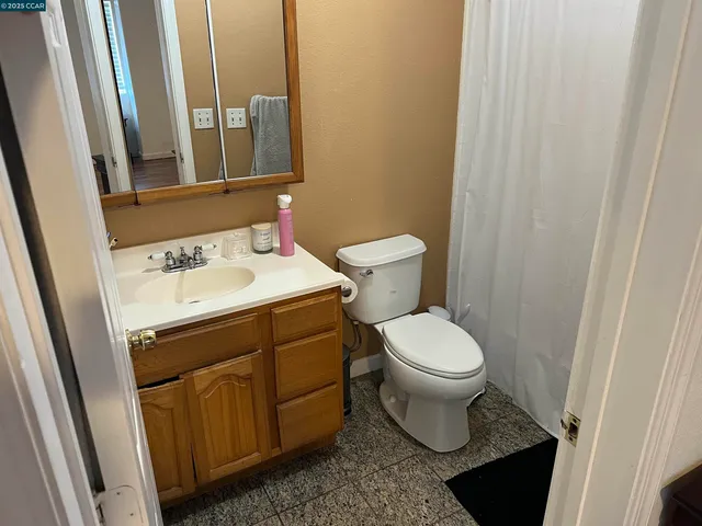 a bathroom with a sink and a toilet