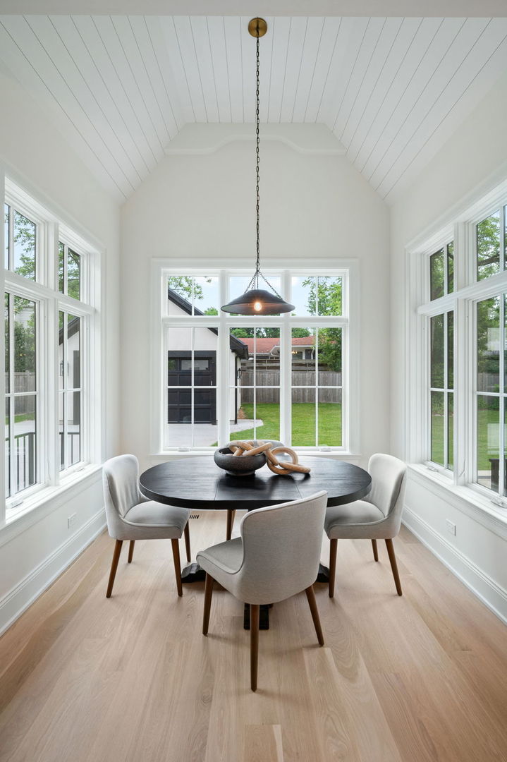 1171 Hohlfelder Road Glencoe, IL 60022 - Photo 12 of 56 a view of a dining room with furniture window and outside view