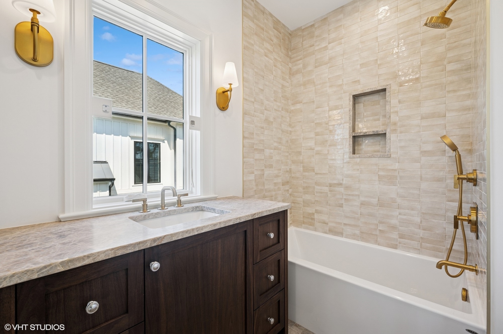 1171 Hohlfelder Road Glencoe, IL 60022 - Photo 32 of 56 a bathroom with a granite countertop sink mirror and a bathtub