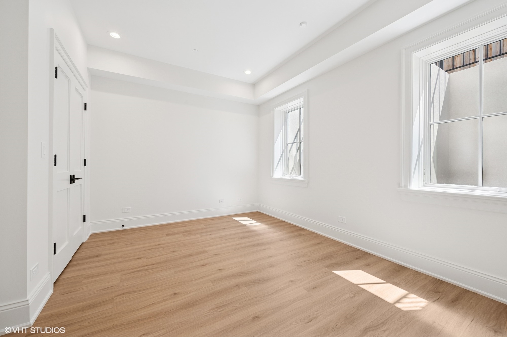 1171 Hohlfelder Road Glencoe, IL 60022 - Photo 40 of 56 a view of an empty room with wooden floor and a window