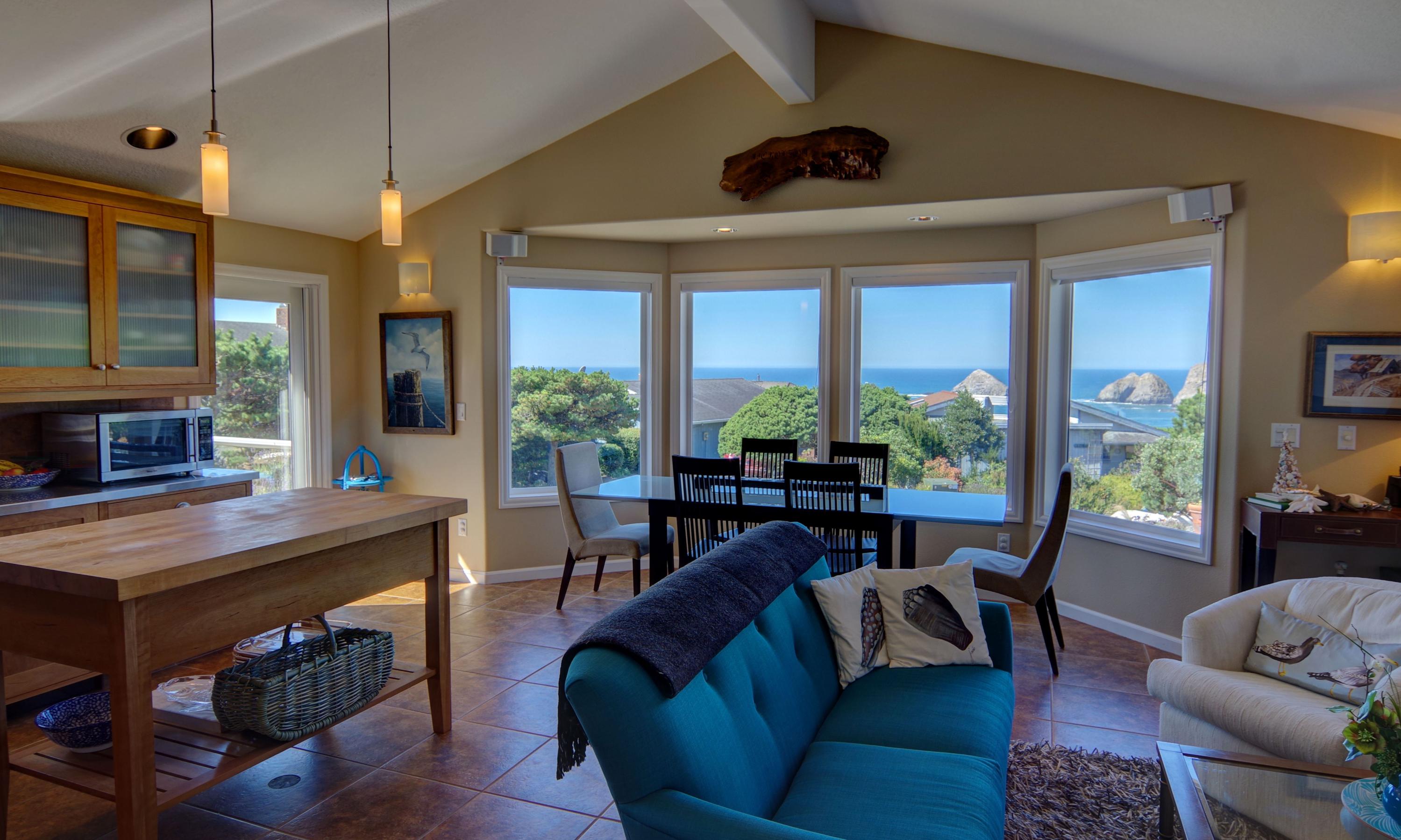 1065 Arthurs Road Oceanside, OR 97141 - Photo 10 of 47 a living room with furniture and a large window