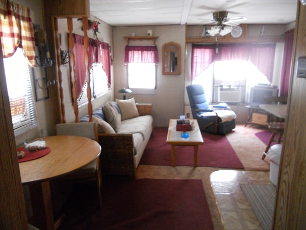 8 S Road, Unit R73 Stafford, CT 06076 - Photo 13 of 28 a living room with furniture and a large window