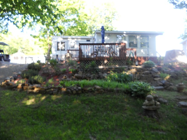 8 S Road, Unit R73 Stafford, CT 06076 - Photo 5 of 28 a view of a city and lake