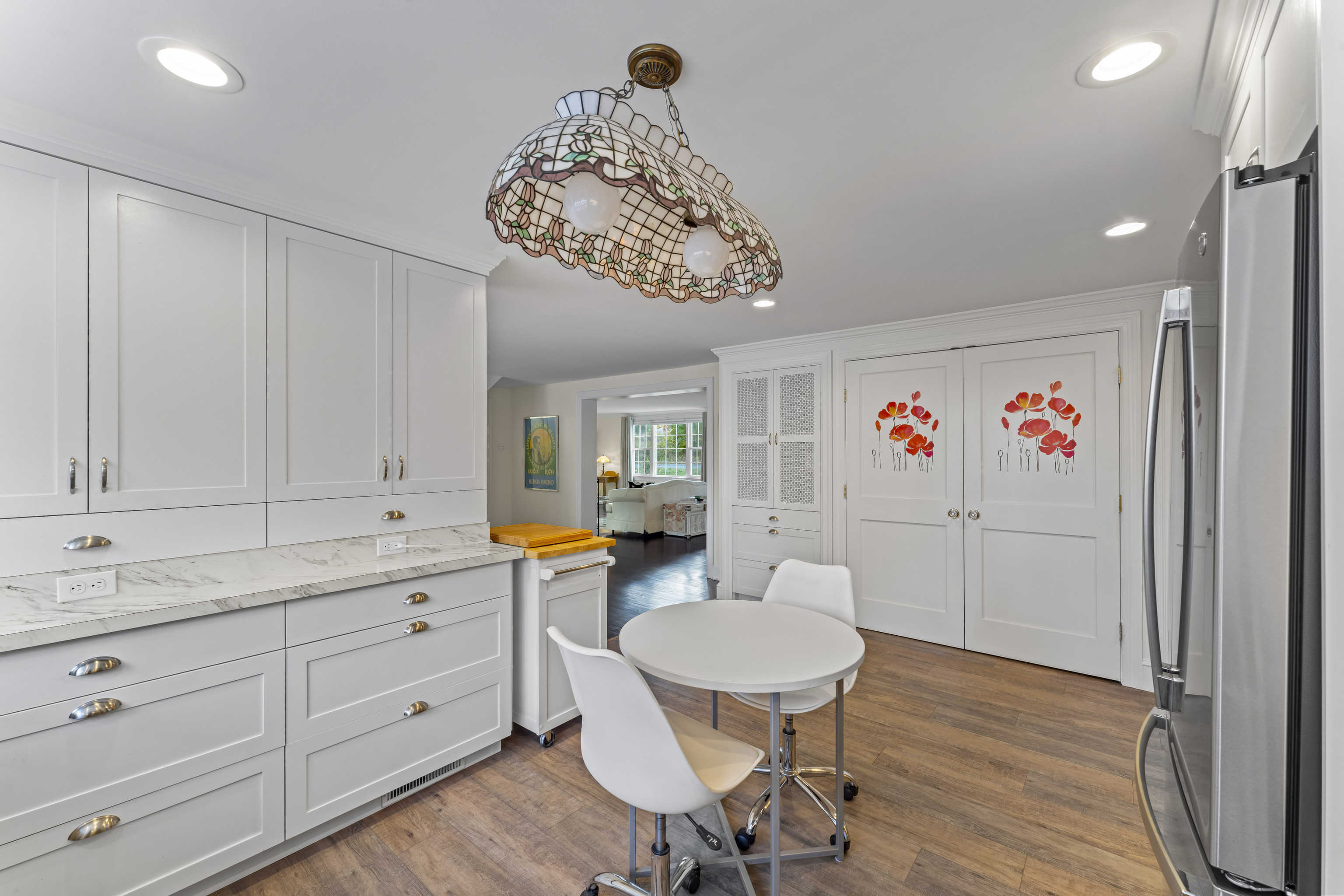 3 Topside Lane Newtown, CT 06470 - Photo 11 of 38 a view of a dining room with furniture wooden floor and a chandelier
