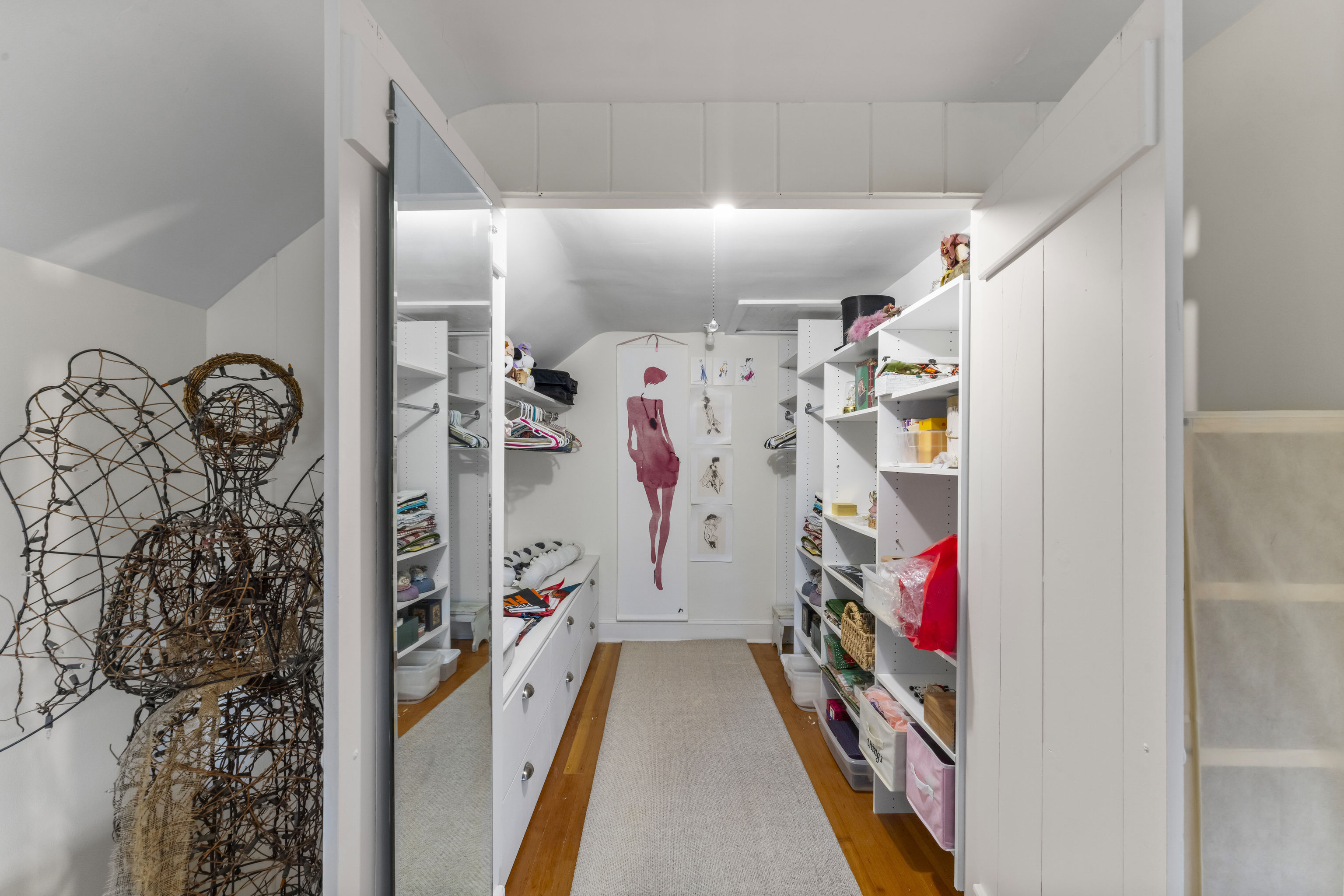 3 Topside Lane Newtown, CT 06470 - Photo 29 of 38 a view of walk in closet with clothes and shoes