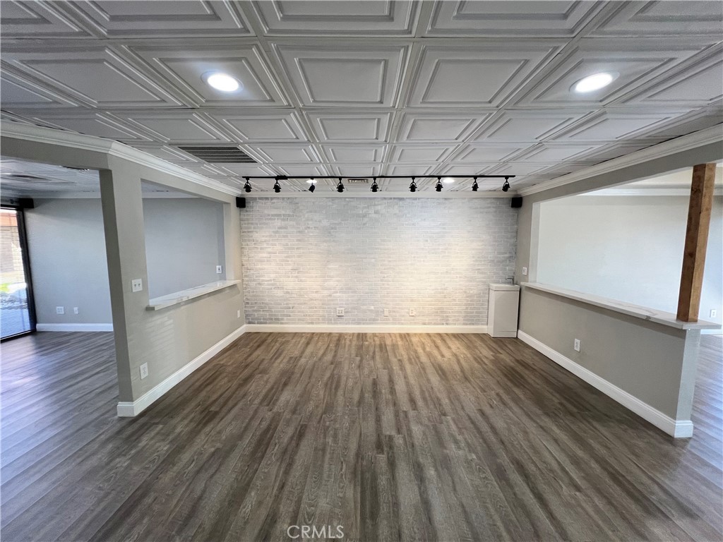 840 West Olive Avenue, Unit C Merced, CA 95348 - Photo 3 of 26 wooden floor in an empty room
