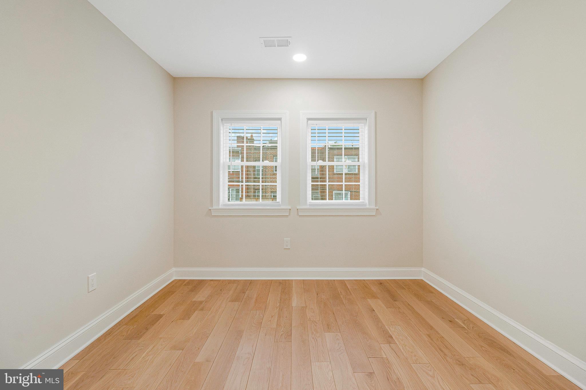 1350 Sheridan Street Northwest Washington, DC 20011 - Photo 20 of 55 an empty room with a window
