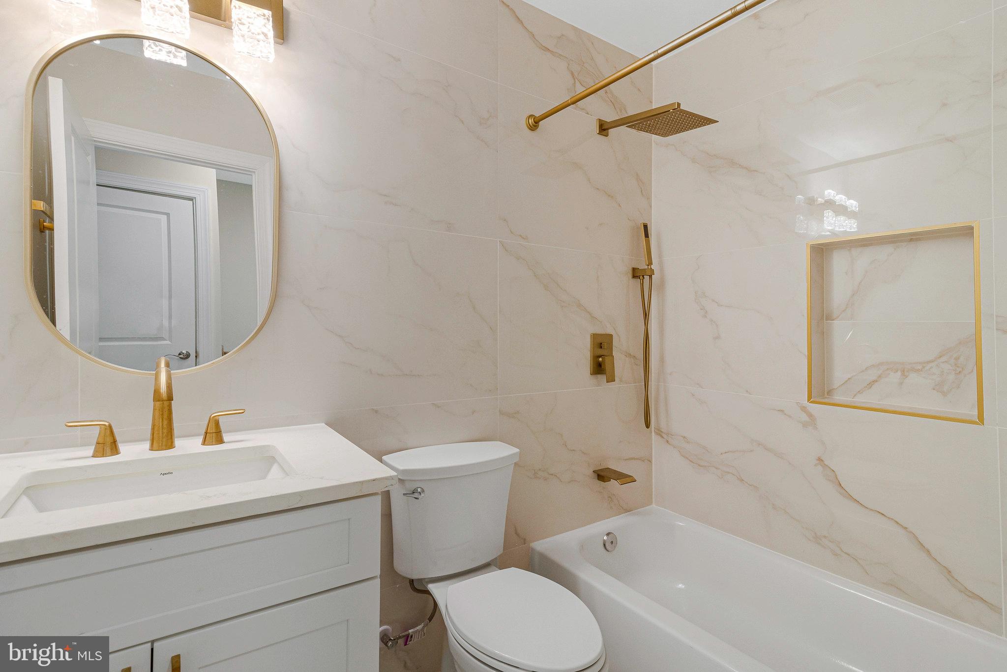 1350 Sheridan Street Northwest Washington, DC 20011 - Photo 26 of 55 a bathroom with a toilet sink and shower