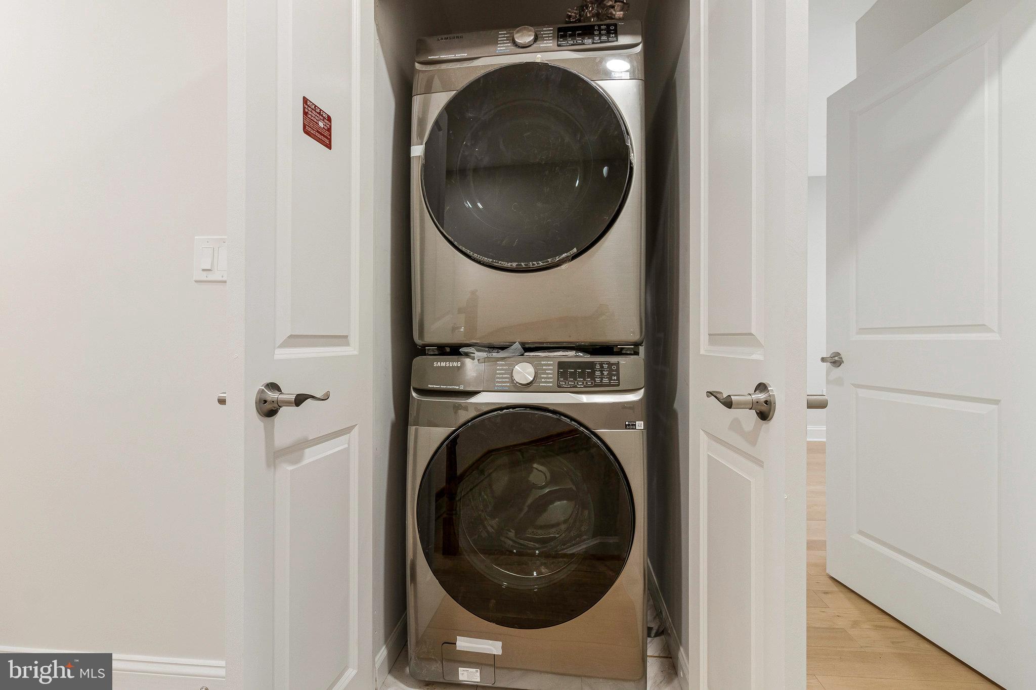 1350 Sheridan Street Northwest Washington, DC 20011 - Photo 28 of 55 a utility room with dryer and washer