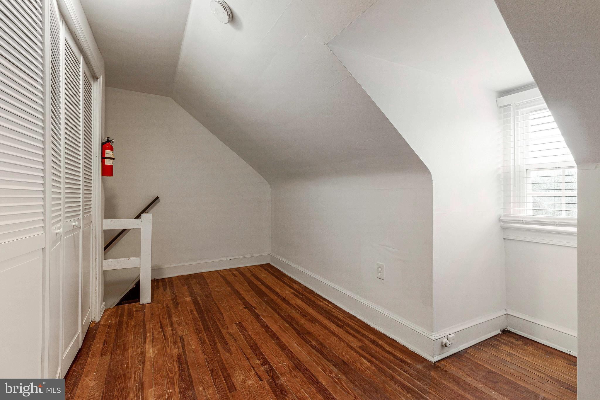 1350 Sheridan Street Northwest Washington, DC 20011 - Photo 37 of 55 a view of room with wooden floor and window