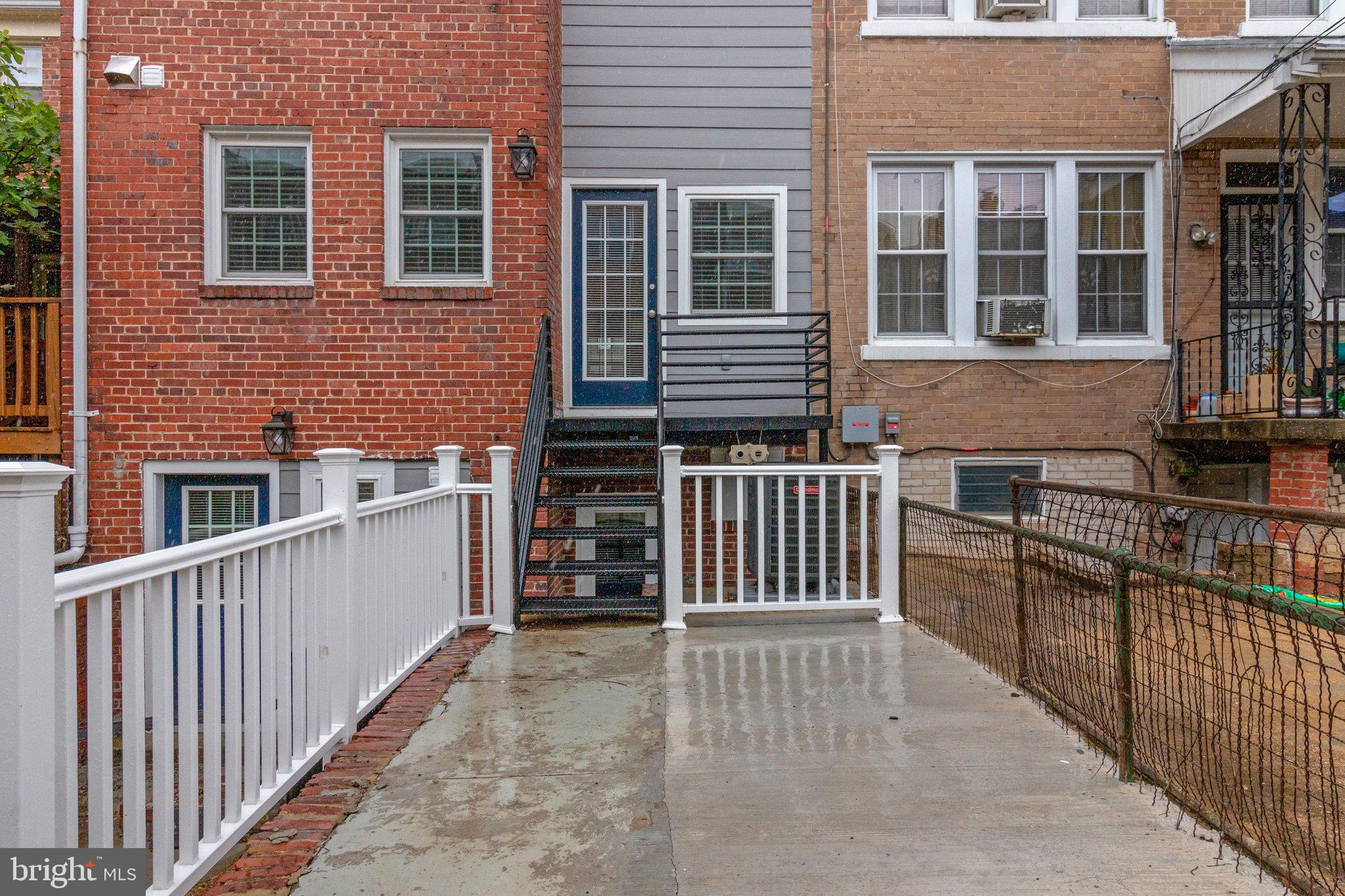 1350 Sheridan Street Northwest Washington, DC 20011 - Photo 54 of 55 front view of a house with wooden fence
