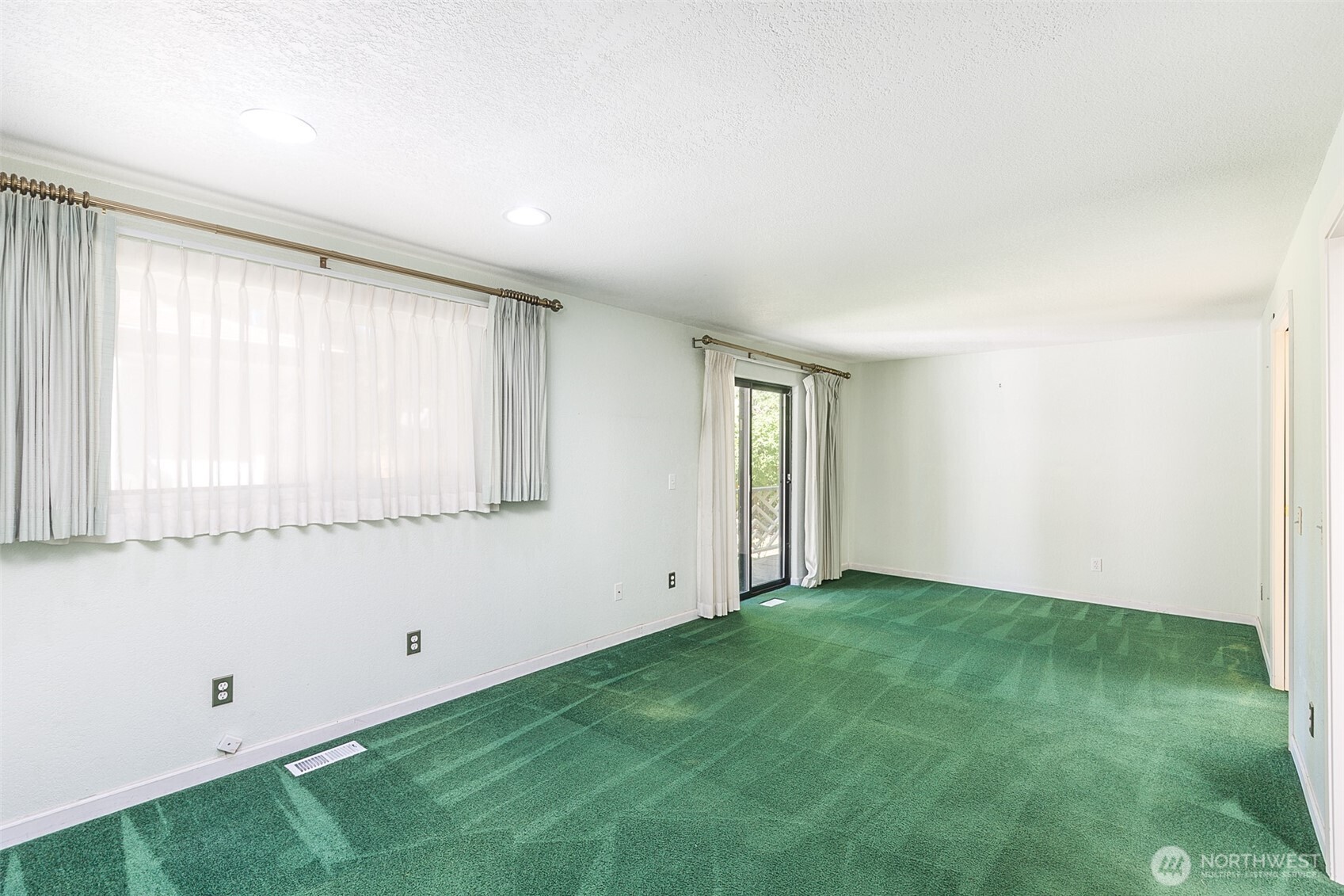 123 Forest Ridge Drive Sequim, WA 98382 - Photo 22 of 32 a view of an empty room with window