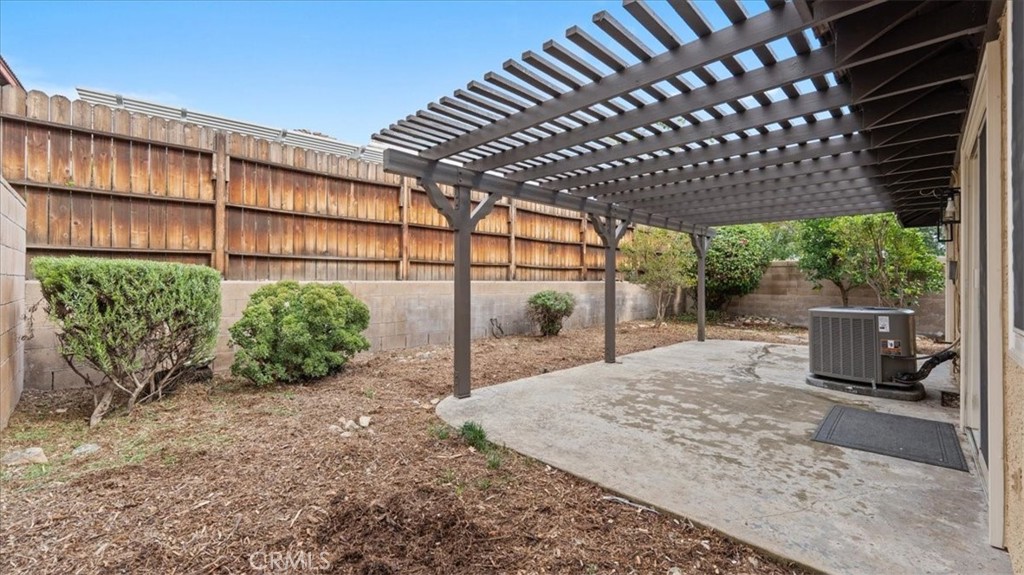 10720 Springfield Drive Rancho Cucamonga, CA 91730 - Photo 21 of 35 a view of a backyard with porch