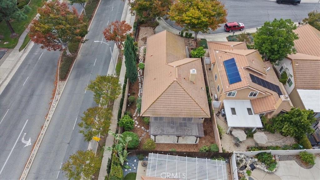 10720 Springfield Drive Rancho Cucamonga, CA 91730 - Photo 28 of 35 an aerial view of a house with a yard and potted plants