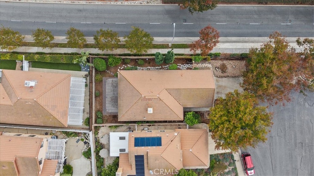 10720 Springfield Drive Rancho Cucamonga, CA 91730 - Photo 29 of 35 an aerial view of a house with a swimming pool