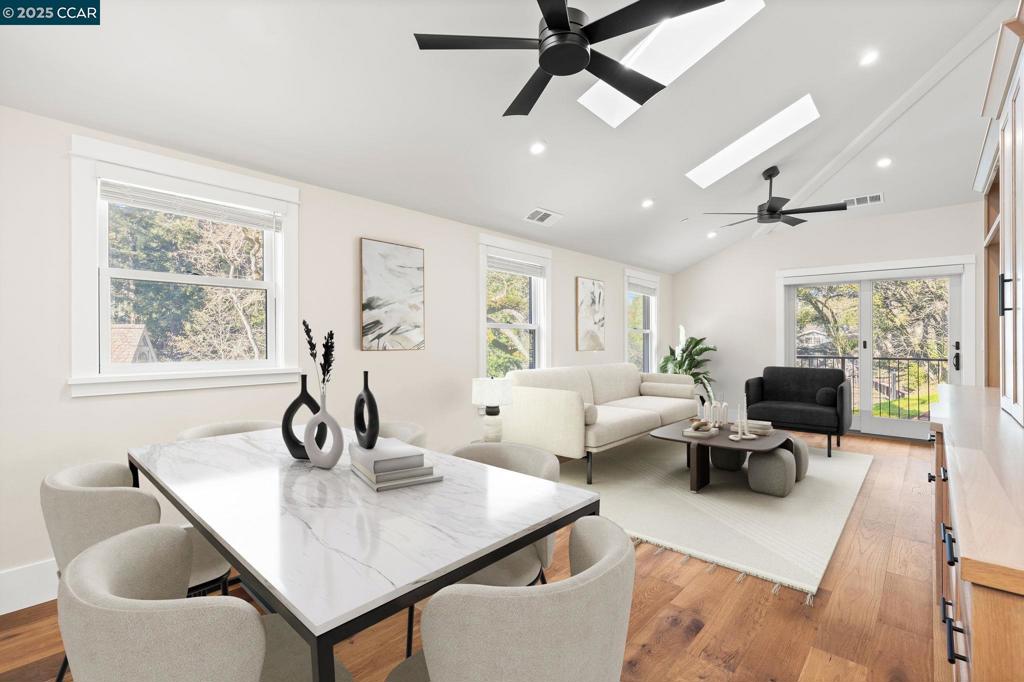 100 Moraga Way Orinda, CA 94563 - Photo 14 of 48 a living room with furniture and a large window