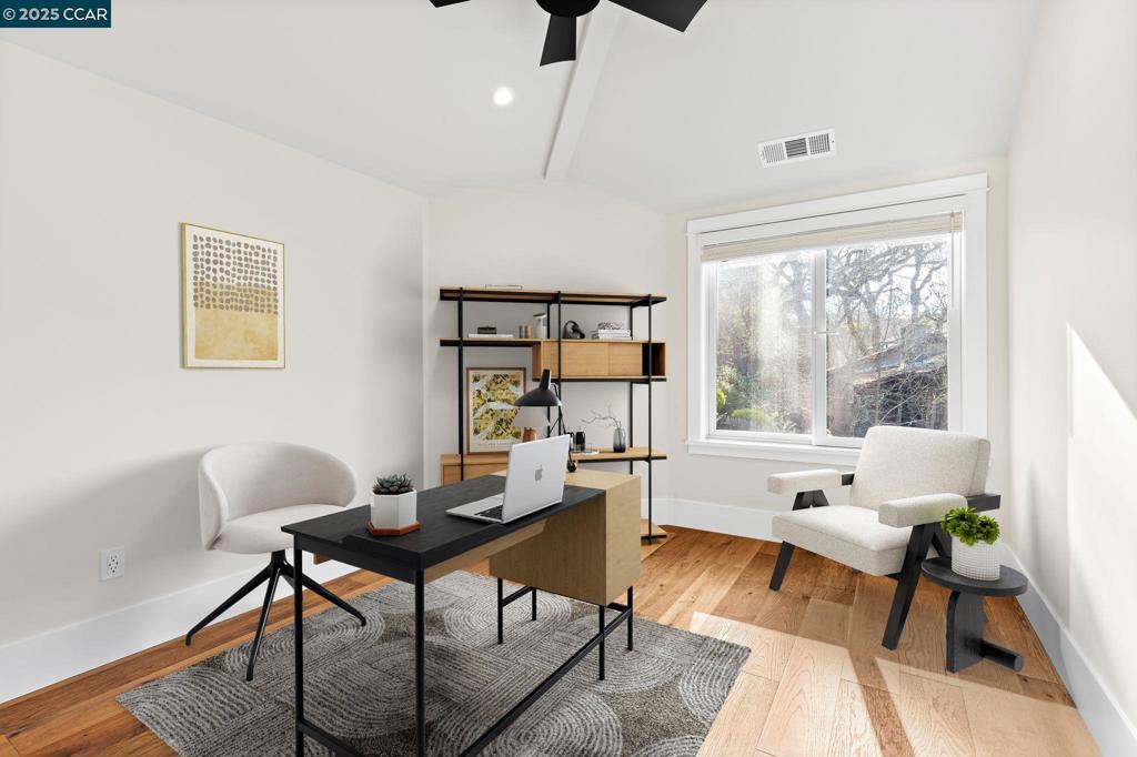 100 Moraga Way Orinda, CA 94563 - Photo 20 of 48 a living room with furniture and a window