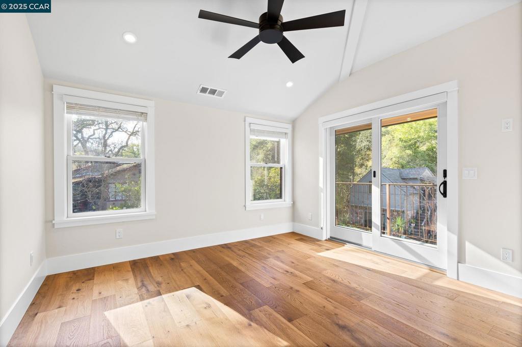 100 Moraga Way Orinda, CA 94563 - Photo 36 of 48 a view of empty room with wooden floor and fan
