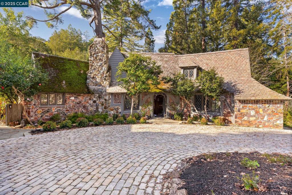 100 Moraga Way Orinda, CA 94563 - Photo 45 of 48 a view of a house with a yard and pathway