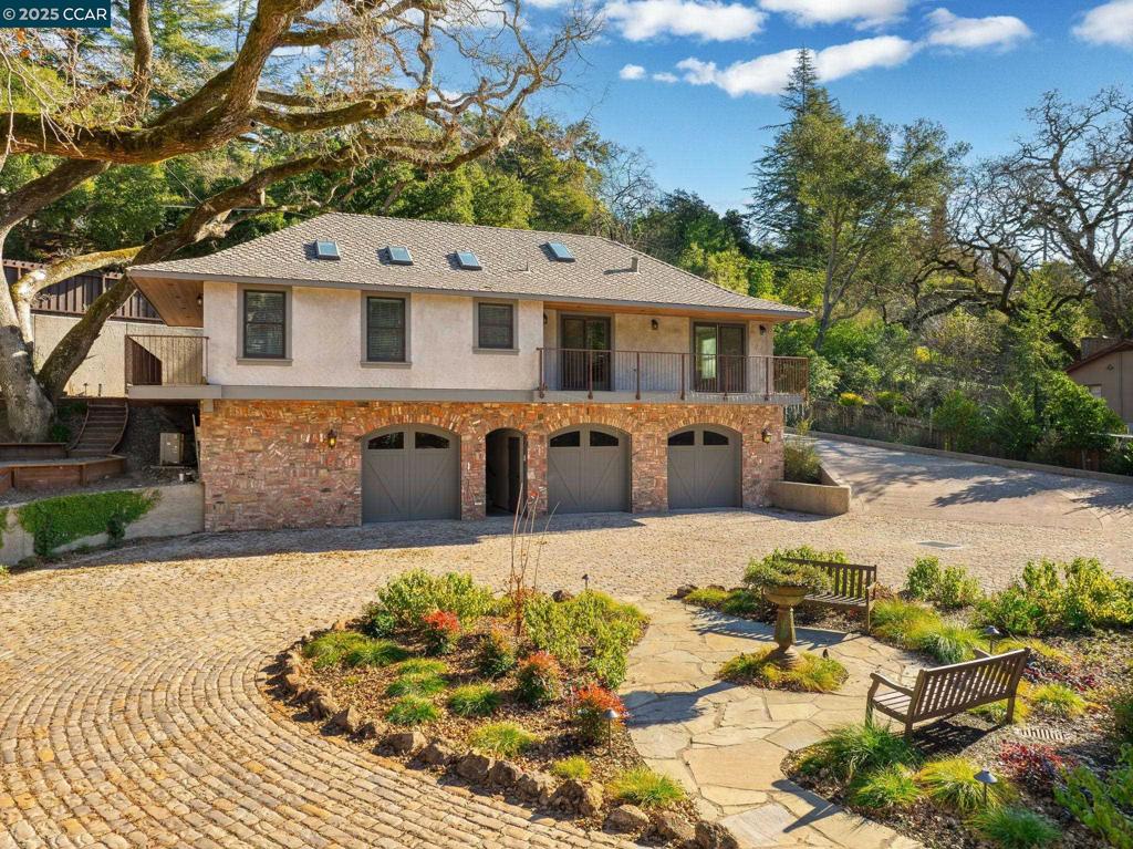 100 Moraga Way Orinda, CA 94563 - Photo 48 of 48 a front view of a house with a yard