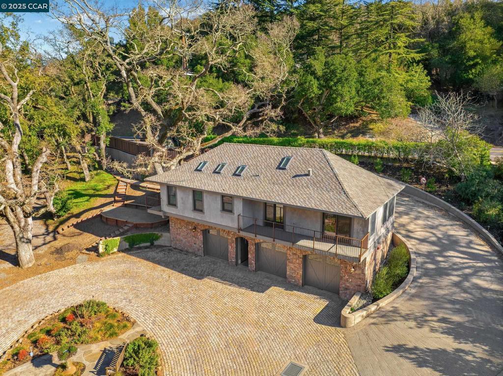 100 Moraga Way Orinda, CA 94563 - Photo 6 of 48 an aerial view of a house with a yard
