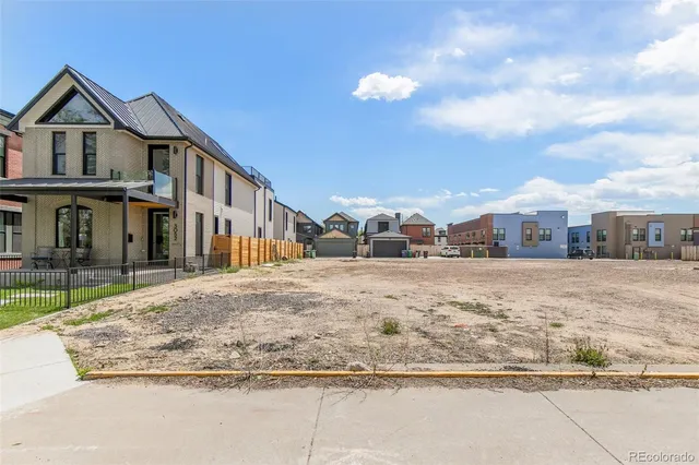 a view of a house with a snow in the yard