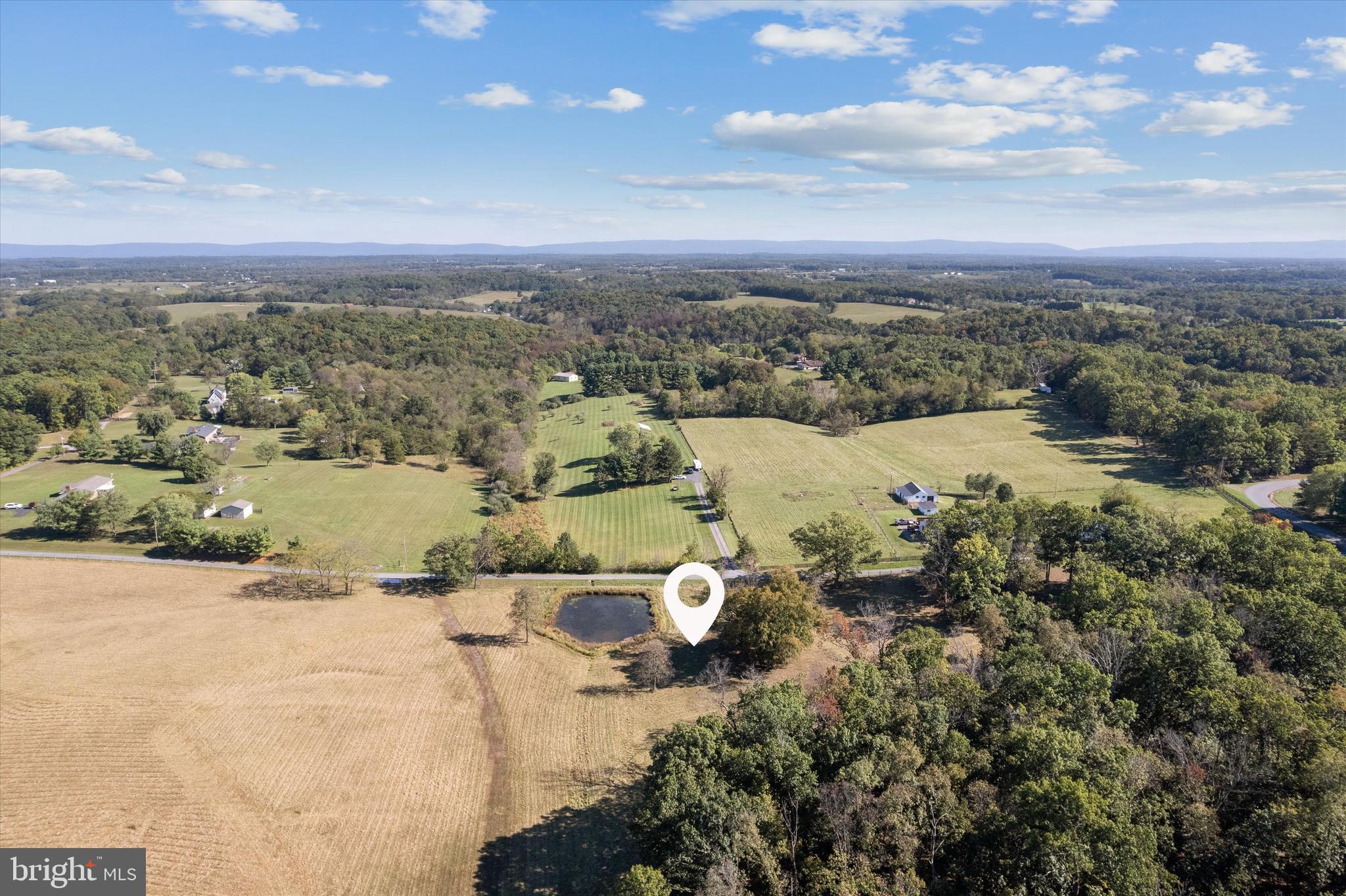 Lot 9 Slate Lane Stephenson, VA 22656 - Photo 11 of 11 an aerial view of a house with a lake view