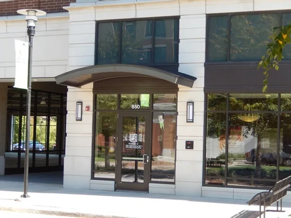 a front view of a building with street