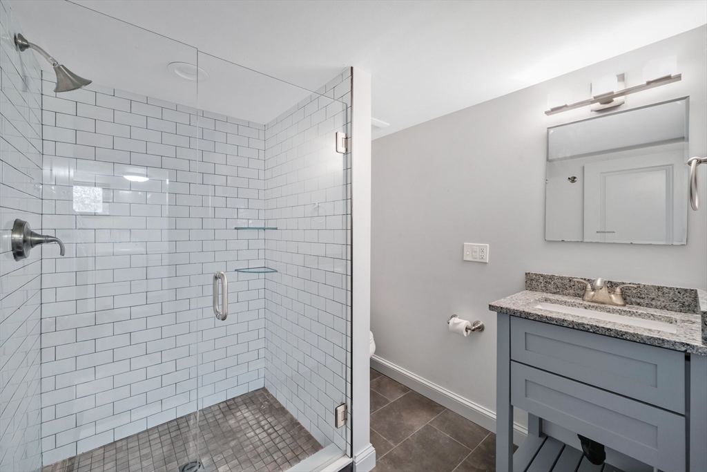 6 Cornwall Street Springfield, MA 01104 - Photo 25 of 40 a bathroom with a sink toilet and shower