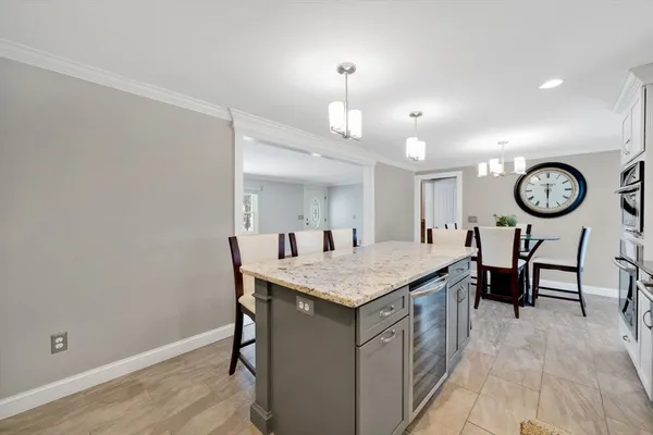 a view of a kitchen counter space and a sink
