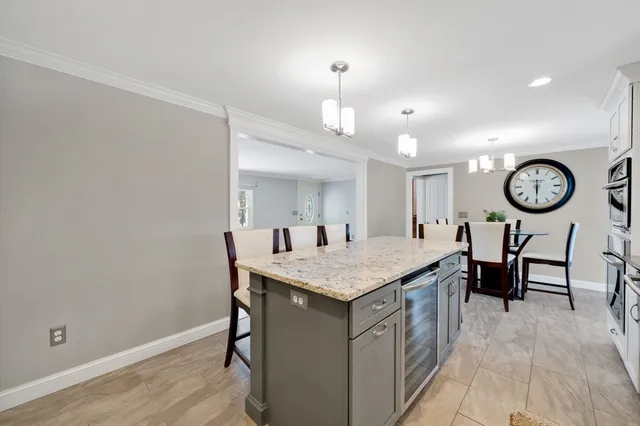 a view of a kitchen counter space and a sink