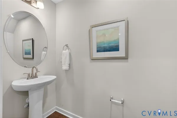 a bathroom with a sink and mirror