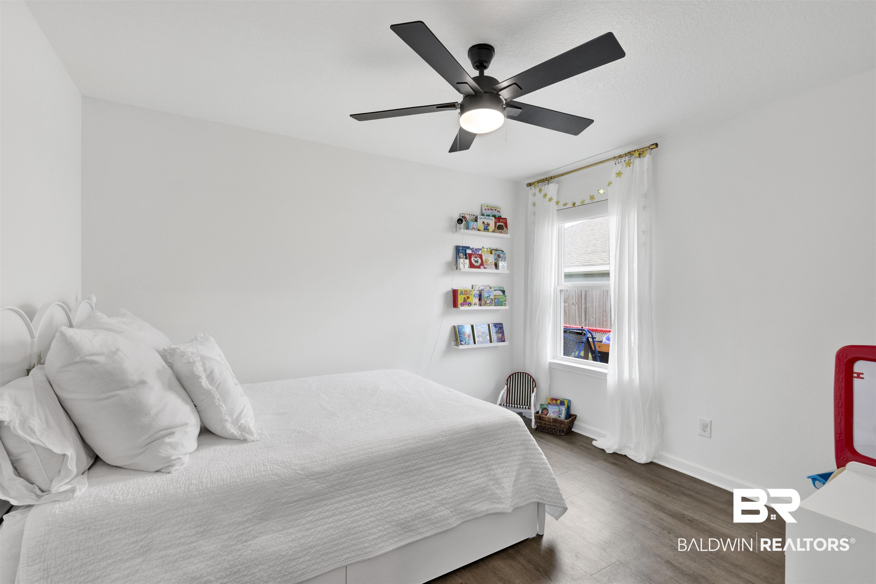 10763 Paget Drive North Mobile, AL 36608 - Photo 15 of 24 Bedroom featuring dark wood finished floors and a ceiling fan