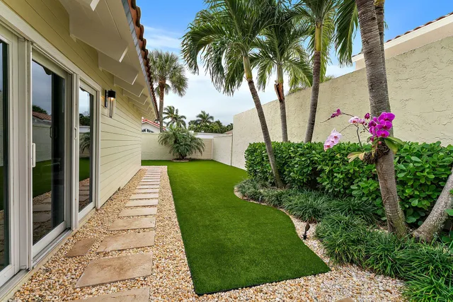 a view of a garden with pathway