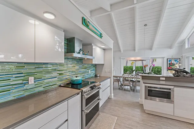 a kitchen with kitchen island granite countertop lots of counter top space