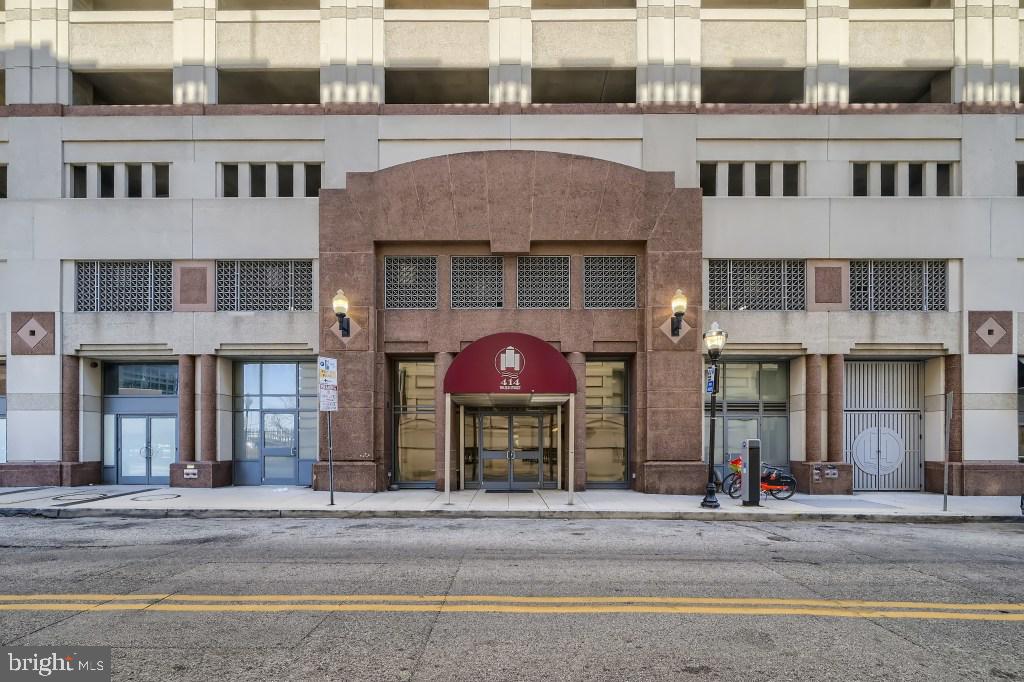 414 Water Street, Unit 2814 Baltimore, MD 21202 - Photo 2 of 28 front view of a brick house with a front door