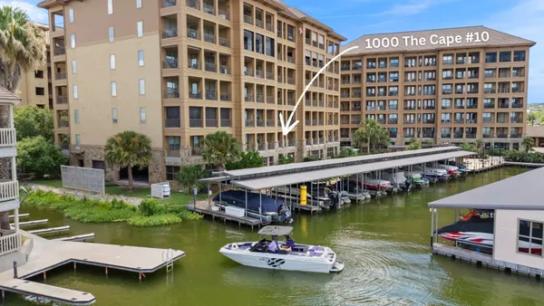 a view of swimming pool with outdoor seating