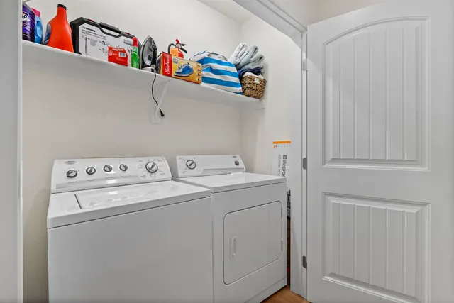 a utility room with dryer and washer