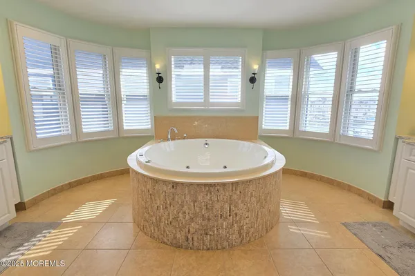 a view of a storage & utility room with a sink