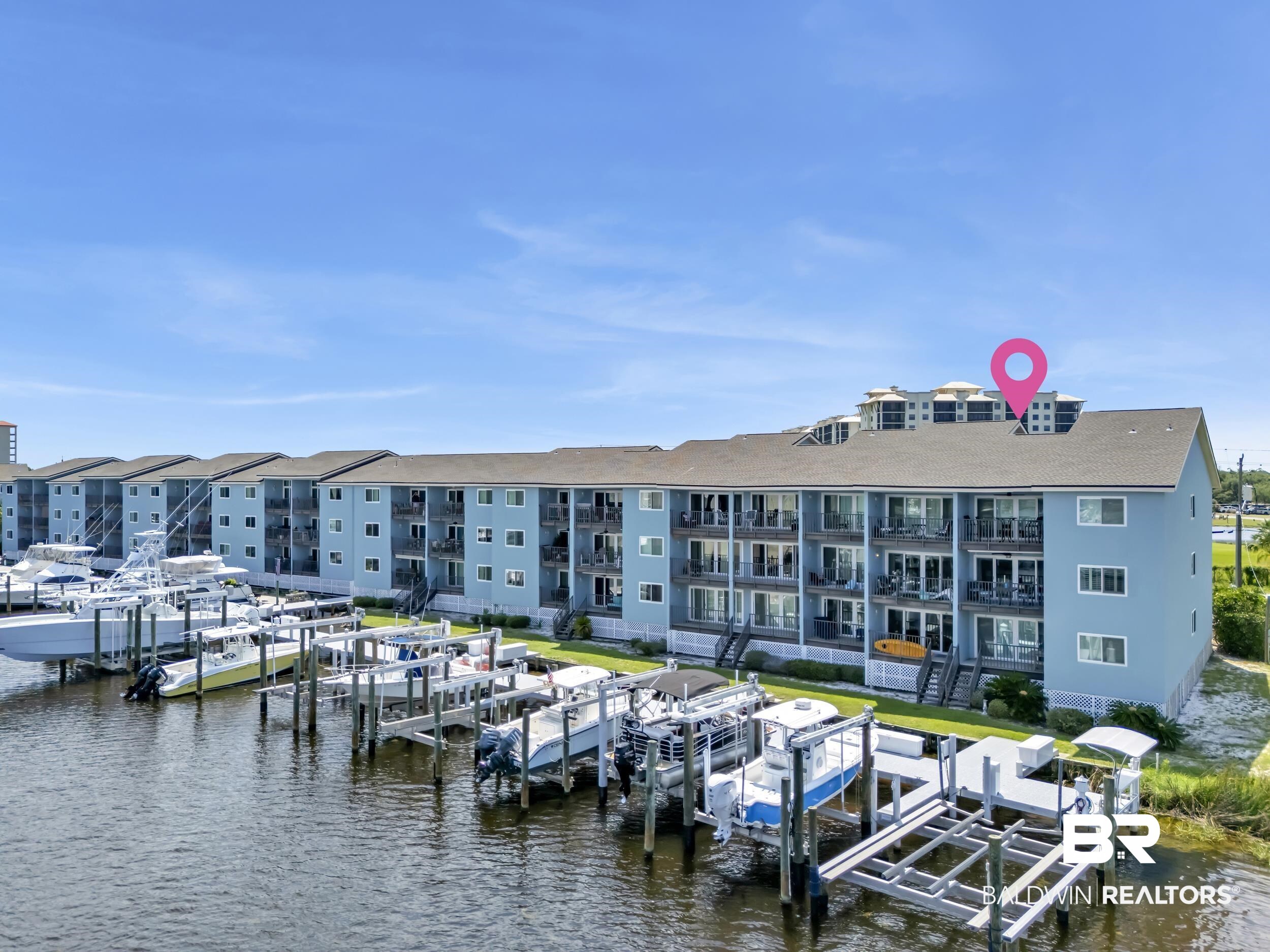 14100 River Road, Unit 211 Pensacola, FL 32507 - Photo 50 of 56 Waterfront property featuring multiple boat slips and lift systems